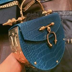 Okhtein- Oak in Brass Bag (Teal)